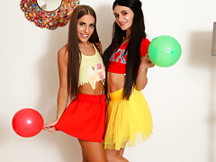 Dusky babes Evelin and Kate Rich tease each other with their hands and mouths then get down with a lesbian 69video